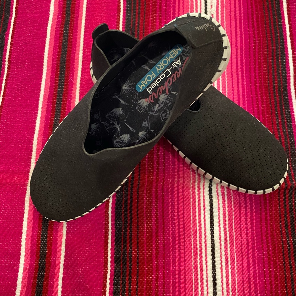 Skechers black air cooled memory foam slip on